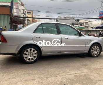 Ford Laser   1.8AT 2004 - Cần bán Ford Laser 1.8AT sản xuất 2004, màu bạc, xe nhập  