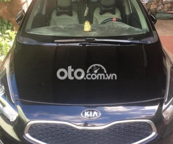 Kia Rondo AT 2016 - Bán Kia Rondo AT sản xuất năm 2016, màu đen xe gia đình