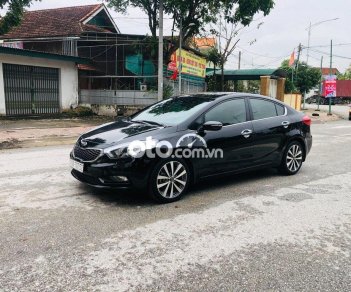 Kia K3 2014 - Bán Kia K3 AT năm sản xuất 2014, màu đen