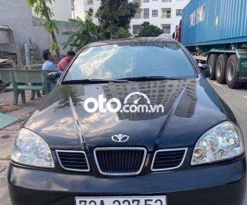 Daewoo Lacetti EX 1.6 MT 2005 - Cần bán lại xe Daewoo Lacetti EX 1.6 MT sản xuất 2005, màu đen, 135 triệu