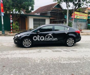 Kia K3 2014 - Bán Kia K3 AT năm sản xuất 2014, màu đen