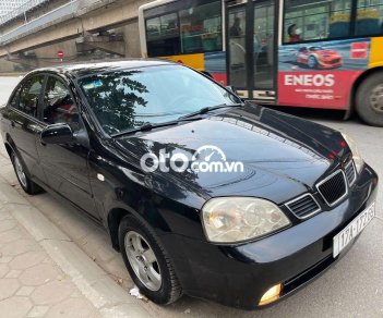 Daewoo Lacetti 2004 - Bán Daewoo Lacetti sản xuất năm 2004, màu đen giá cạnh tranh