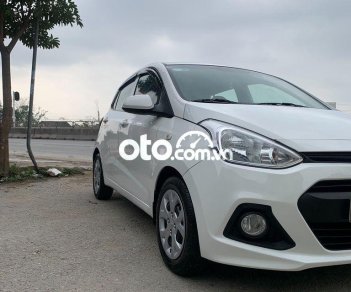 Hyundai Premio MT  2015 - Cần bán gấp Hyundai Grand i10 MT sản xuất năm 2015, màu trắng, xe nhập