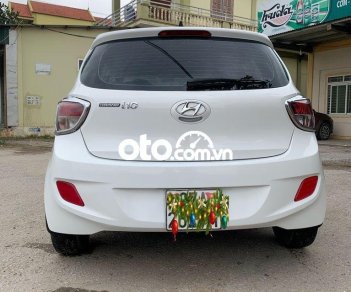 Hyundai Premio MT  2015 - Cần bán gấp Hyundai Grand i10 MT sản xuất năm 2015, màu trắng, xe nhập