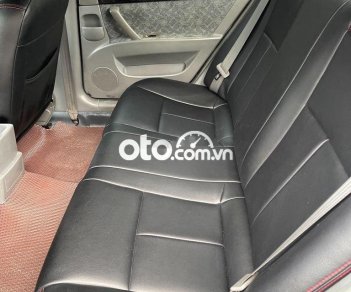 Daewoo Lacetti 2004 - Bán Daewoo Lacetti sản xuất năm 2004, màu đen giá cạnh tranh