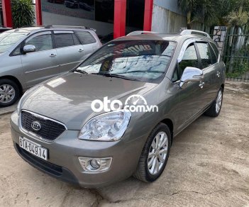 Kia Carens MT 2011 - Bán Kia Carens MT sản xuất 2011, màu xám xe gia đình