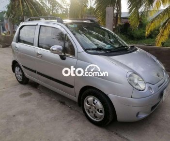 Daewoo Matiz MT 2004 - Bán Daewoo Matiz MT năm 2004, màu bạc, xe nhập xe gia đình