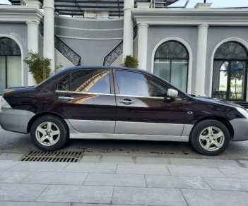 Mitsubishi Lancer 1.6 2003 - Cần bán Mitsubishi Lancer 1.6 sản xuất năm 2003, màu nâu giá cạnh tranh