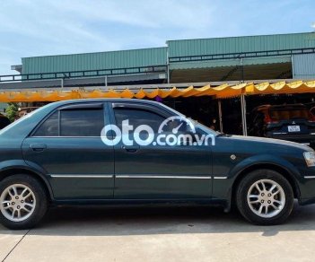 Ford Laser 1.6MT 2003 - Cần bán Ford Laser 1.6MT sản xuất 2003, màu xanh lam, giá tốt