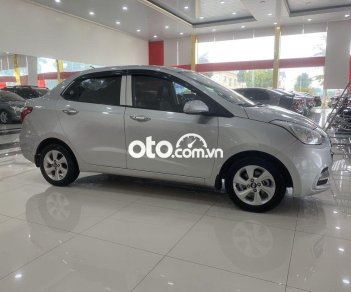 Hyundai Premio    1.2 AT  2018 - Cần bán lại xe Hyundai Grand i10 1.2 AT sản xuất năm 2018, màu bạc