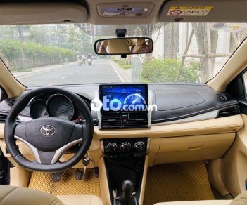 Toyota Vios E 2015 - Bán Toyota Vios E năm sản xuất 2015, màu đen số sàn, giá chỉ 295 triệu