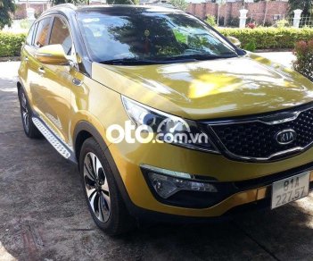 Kia Sportage 2011 - Cần bán gấp Kia Sportage 1.6GDi sản xuất năm 2011, màu vàng, nhập khẩu