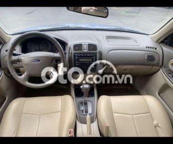 Ford Laser 1.8AT 2003 - Cần bán xe Ford Laser 1.8AT năm sản xuất 2003, màu xám, giá tốt