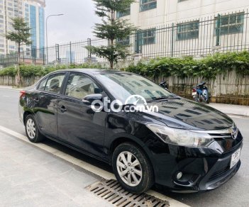 Toyota Vios E 2015 - Bán Toyota Vios E năm sản xuất 2015, màu đen số sàn, giá chỉ 295 triệu