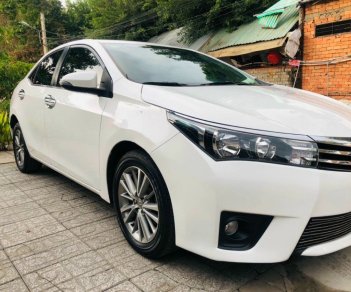 Toyota Corolla 2016 - Cần bán gấp Toyota Corolla G năm 2016, màu trắng