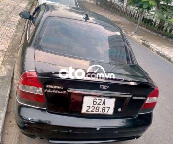 Daewoo Nubira  MT 2003 - Cần bán lại xe Daewoo Nubira MT năm sản xuất 2003, màu đen chính chủ