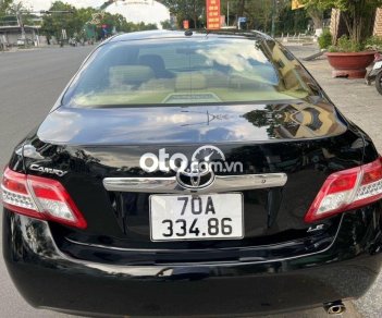 Toyota Camry LE 2.4 2010 - Bán Toyota Camry LE 2.4 năm 2010, màu đen xe gia đình