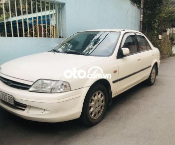 Ford Laser  1.6 2010 - Xe Ford Laser 1.6 sản xuất năm 2010, màu trắng, nhập khẩu