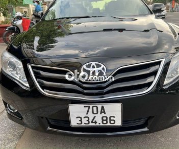 Toyota Camry LE 2.4 2010 - Bán Toyota Camry LE 2.4 năm 2010, màu đen xe gia đình