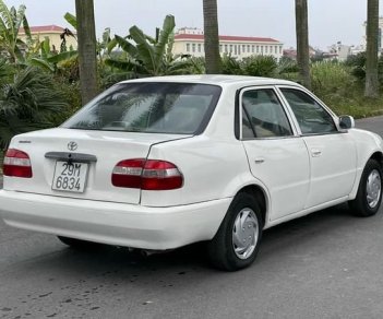 Toyota Corolla MT 2001 - Bán ô tô Toyota Corolla MT sản xuất 2001, màu trắng, giá chỉ 99 triệu