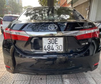 Toyota Corolla altis 2017 - Bán gấp Toyota Corolla Altis 1.8G AT năm 2017, màu đen, còn nguyên dàn lốp, xe rất mới, giá tốt