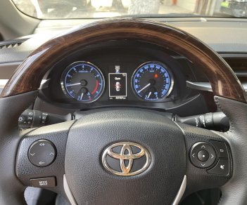 Toyota Corolla altis 2017 - Bán gấp Toyota Corolla Altis 1.8G AT năm 2017, màu đen, còn nguyên dàn lốp, xe rất mới, giá tốt