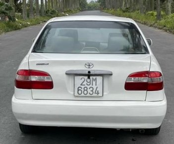 Toyota Corolla MT 2001 - Bán ô tô Toyota Corolla MT sản xuất 2001, màu trắng, giá chỉ 99 triệu