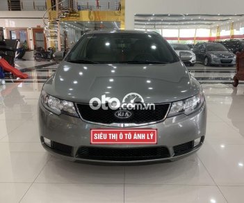 Kia Forte  1.6MT 2011 - Cần bán xe Kia Forte 1.6MT sản xuất 2011, màu xám