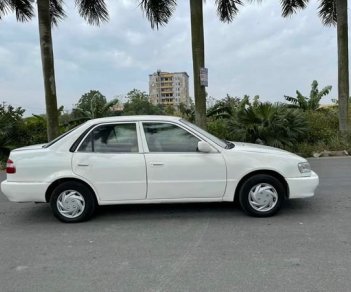 Toyota Corolla MT 2001 - Bán ô tô Toyota Corolla MT sản xuất 2001, màu trắng, giá chỉ 99 triệu