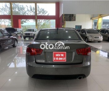 Kia Forte  1.6MT 2011 - Cần bán xe Kia Forte 1.6MT sản xuất 2011, màu xám