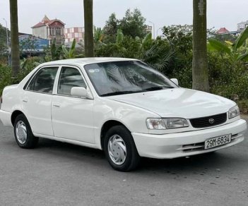 Toyota Corolla MT 2001 - Bán ô tô Toyota Corolla MT sản xuất 2001, màu trắng, giá chỉ 99 triệu