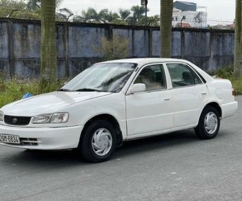 Toyota Corolla MT 2001 - Bán ô tô Toyota Corolla MT sản xuất 2001, màu trắng, giá chỉ 99 triệu