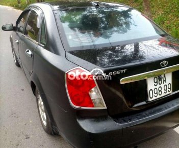 Daewoo Lacetti SE 2009 - Cần bán xe Daewoo Lacetti SE sản xuất năm 2009, màu đen giá cạnh tranh