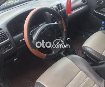 Mazda 323 1.6 MT 1999 - Bán Mazda 323 1.6 MT sản xuất 1999, màu xanh giá chỉ 62 triệu