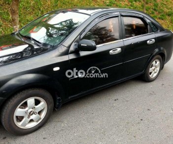 Daewoo Lacetti SE 2009 - Cần bán xe Daewoo Lacetti SE sản xuất năm 2009, màu đen giá cạnh tranh