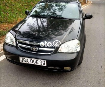 Daewoo Lacetti SE 2009 - Cần bán xe Daewoo Lacetti SE sản xuất năm 2009, màu đen giá cạnh tranh