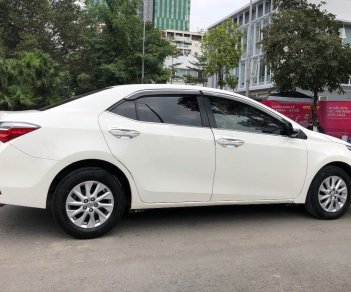 Toyota Corolla 2019 - Cần bán lại xe Toyota Corolla Altis sản xuất 2019, màu trắng, giá tốt