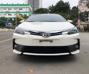 Toyota Corolla 2019 - Cần bán lại xe Toyota Corolla Altis sản xuất 2019, màu trắng, giá tốt