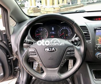 Kia K3 2.0AT 2014 - Cần bán lại xe Kia K3 2.0AT sản xuất năm 2014, màu đen, giá tốt