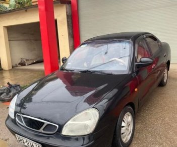 Daewoo Nubira 2.0 2002 - Bán xe Daewoo Nubira 2.0 sản xuất năm 2002, màu đen giá cạnh tranh