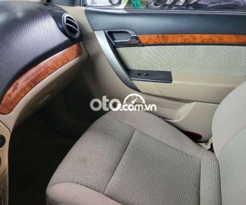 Daewoo Gentra SX 2006 - Cần bán Daewoo Gentra SX năm 2006, màu đen, xe nhập