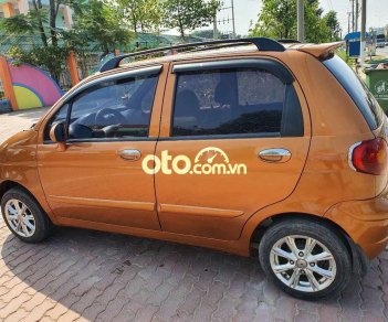 Daewoo Matiz MT 2003 - Cần bán lại xe Daewoo Matiz MT sản xuất 2003, màu nâu, giá tốt