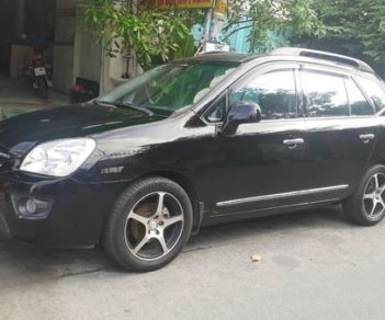 Kia Carens 2.0 2009 - Bán ô tô Kia Carens 2.0 năm 2009, màu đen còn mới, giá 245tr