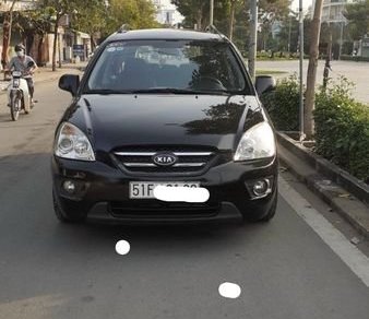 Kia Carens 2.0 2009 - Bán ô tô Kia Carens 2.0 năm 2009, màu đen còn mới, giá 245tr