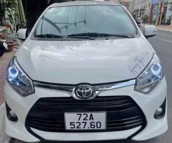 Toyota Wigo 2019 - Bán Toyota Wigo 1.2 G MT năm 2019, màu trắng số sàn, xe gia đình sử dụng, bao check test thoải mái