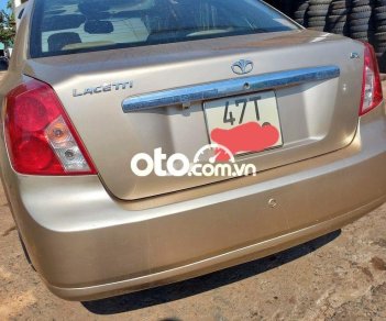 Daewoo Lacetti EX 2004 - Bán Daewoo Lacetti EX đời 2004, màu vàng, nhập khẩu