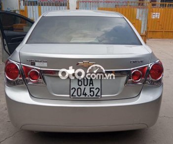 Chevrolet Cruze MT 2010 - Cần bán Chevrolet Cruze MT sản xuất 2010, màu bạc