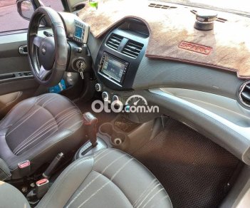 Chevrolet Spark LTZ 2014 - Cần bán gấp Chevrolet Spark LTZ sản xuất 2014, màu bạc