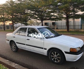 Mazda 323 MT 1995 - Bán Mazda 323 MT sản xuất năm 1995, màu trắng, xe nhập