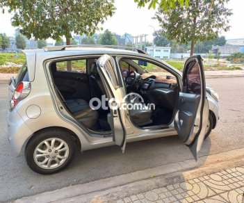 Chevrolet Spark LTZ 2014 - Cần bán gấp Chevrolet Spark LTZ sản xuất 2014, màu bạc